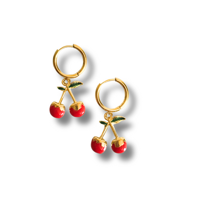 18K gold-filled material, this earring is perfect for sensitive skin, hypoallergenic, and tarnish-free. Add a bold, fruity pop to your summer look.
Gold hoop earring with dangling red cherry charms, playful summer accessory