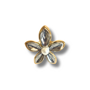 Flower-shaped brooch with gold and silver petals on a white background.18K gold-filled materials, it's hypoallergenic, waterproof, and tarnish-free—so you never have to take it off, even on beach days or during daily hand washes.adjustable floral pearl ring, gold pearl flower ring, mixed metal ring, summer jewelry, waterproof ring, hypoallergenic ring, tarnish-free jewelry, statement floral ring
