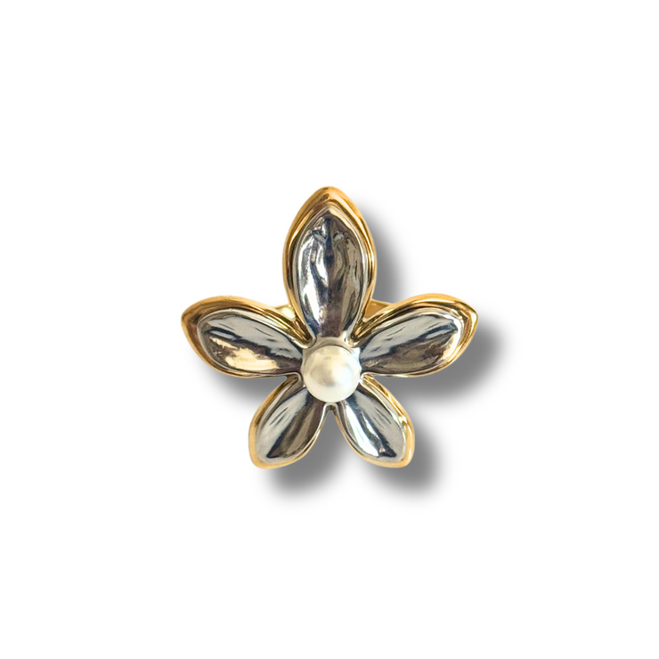 Flower-shaped brooch with gold and silver petals on a white background.18K gold-filled materials, it&