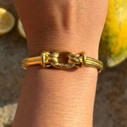 Statement cuff with a large knot at the center