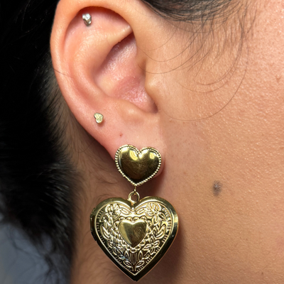 Unique heart locket dangle earring that opens to hold a small photo, hypoallergenic and tarnish-free, perfect for sentimental keepsakes.