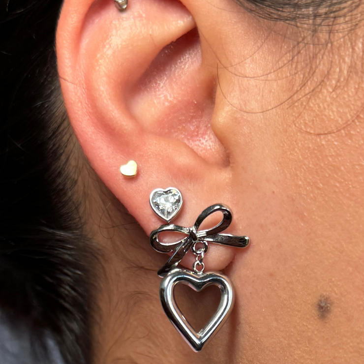 Stainless steal dangle earring that as the cutest bow and heart earring perfect for the any occassion 