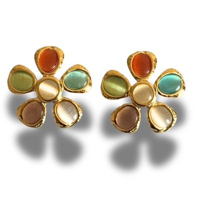 Pair of flower-shaped earrings with multicolored centers on a white background.Gold flower stud with multicolor gemstone petals—orange, green, blue, brown, cream, beige; hypoallergenic statement earring