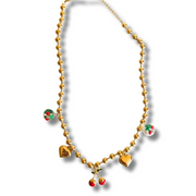 Gold necklace with colorful beads on a white background. cherry charm necklace, fruity gold necklace, playful heart charm necklace, sweet summer jewelry
Cherry Sweetheart Charm Necklace
Fruit-Inspired Cherry and Heart Necklace