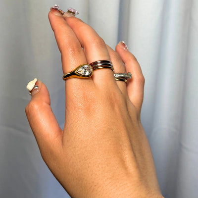Golden Hour Teardrop Ring – Sideways teardrop CZ statement ring, hypoallergenic and tarnish-free, size 7.