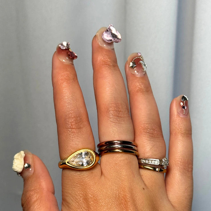 Golden Hour Teardrop Ring – Sideways teardrop CZ statement ring, hypoallergenic and tarnish-free, size 7.
