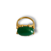 Gold ring with a green gemstone on a white background. Green gemstone statement ring in 18k gold-filled finish; size 7 only; tarnish-free and waterproof for daily wear