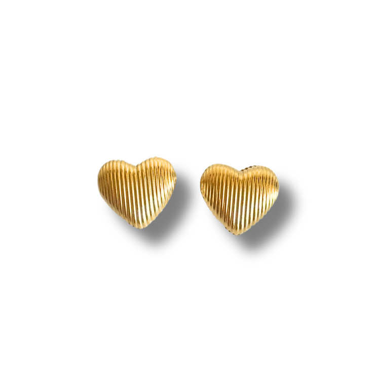 Gold heart-shaped earrings on a white background. 18K gold-filled material, these studs are lightweight, tarnish-free, and gentle on sensitive skin – a must-have everyday piece with a little personality.
Textured gold heart stud earrings with bubble design, hypoallergenic and lightweight