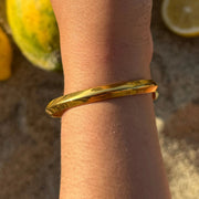 The Triángulo Cuff is a delicate, minimalist cuff with a triangle-shaped point at the center. Lightweight yet striking, it’s the perfect balance of symmetry and style. Adjustable, tarnish-free, and waterproof — made to last and layer.