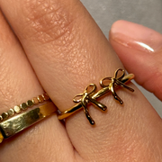 Delicate bow ring with a graceful, feminine design. Gold Filled Hypoallergenic, tarnish-free, and perfect for stacking or wearing alone. Available in sizes 6, 7, 8, and 9.