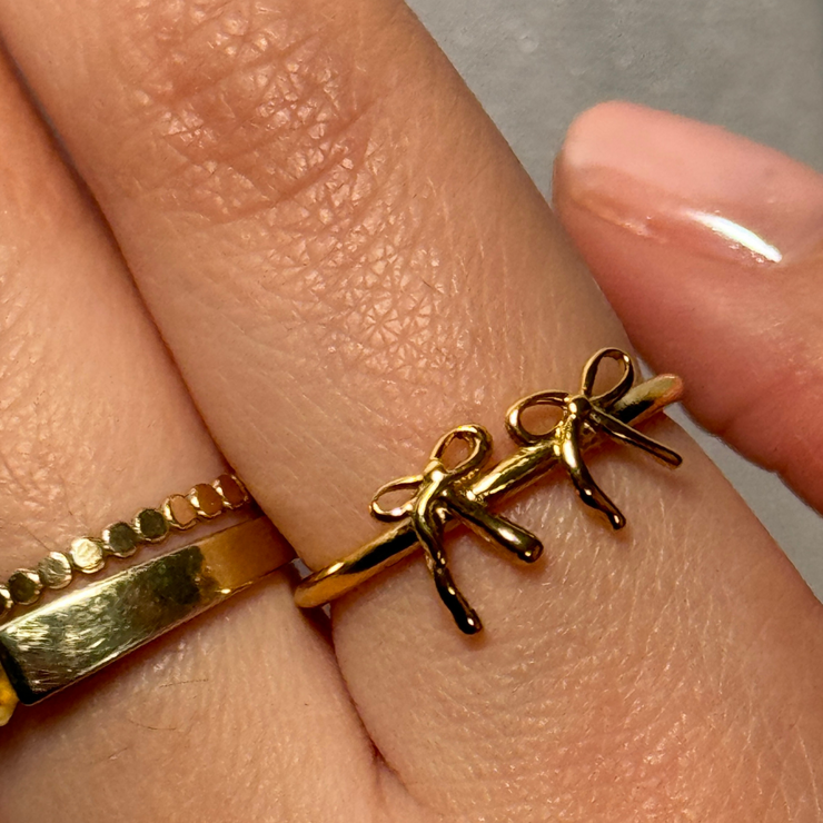 Delicate bow ring with a graceful, feminine design. Gold Filled Hypoallergenic, tarnish-free, and perfect for stacking or wearing alone. Available in sizes 6, 7, 8, and 9.